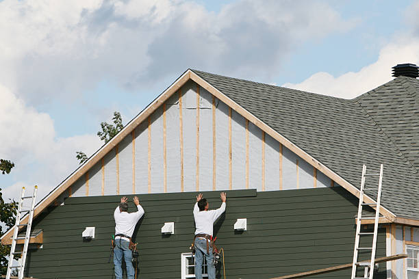 Professional Siding technician working in Adamstown, PA